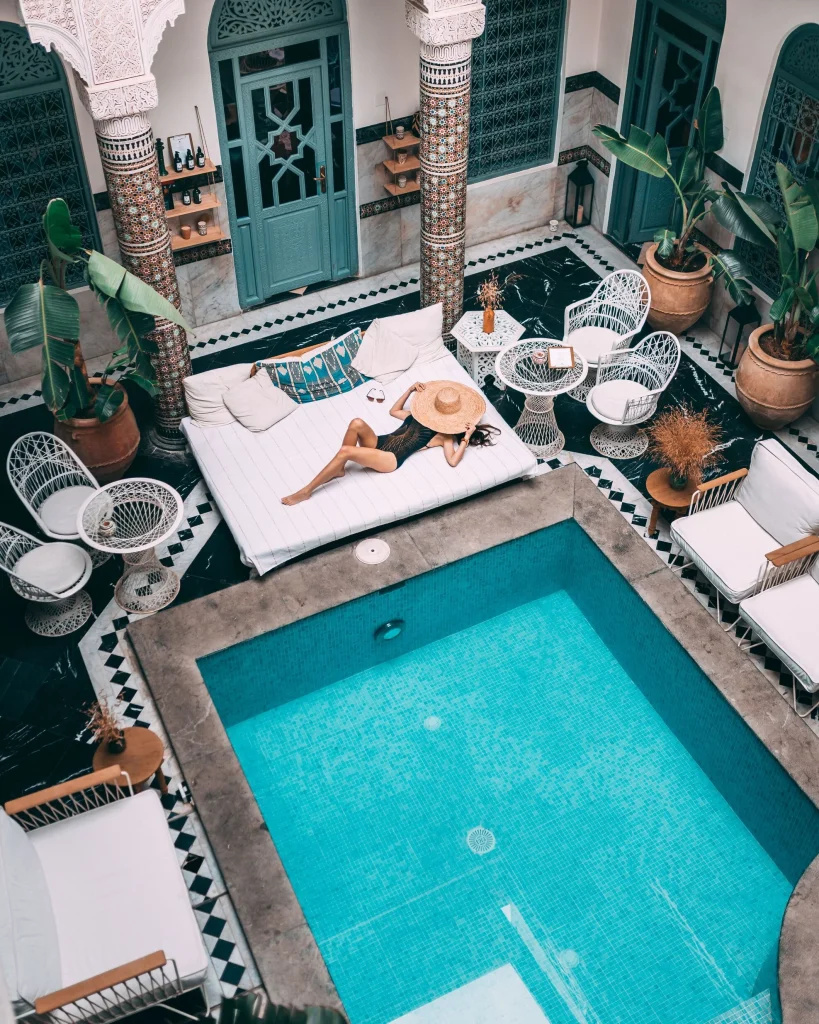 property facade or courtyard with a pool